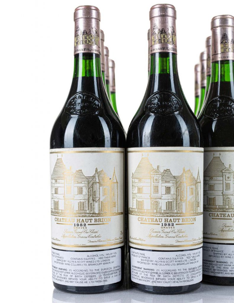 Lots 459, 460: 12 bottles each 1982 Chateau Haut Brion